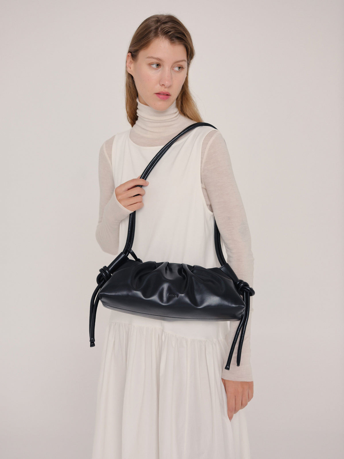 Borsa Dumpling | Eleganza e Versatilità